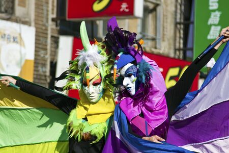 New Taipei City, Taiwan - OCT 03, 2015: Carnival Dancers in the Tamsui Environmental Arts Festival Paradeのeditorial素材