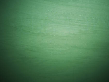 Chalkboard blackboard. Green chalk board texture empty blank with chalk traces.の写真素材