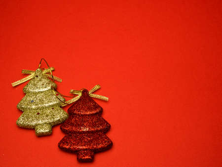 christmas card conception with diversity decorations on red backgroundの写真素材