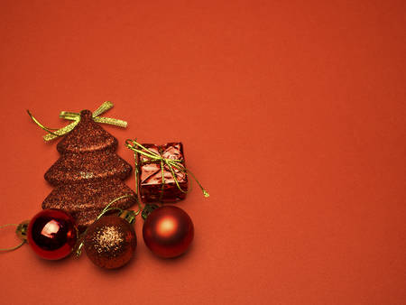 christmas card conception with diversity decorations on red backgroundの写真素材