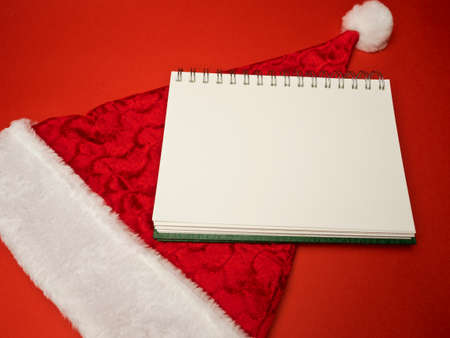 christmas card conception with diversity decorations on red backgroundの写真素材