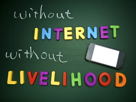 text without internet without livelihood on blackboardの写真素材