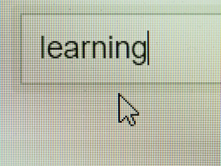 Business and technology: learning text on screen with some copy spaceの写真素材