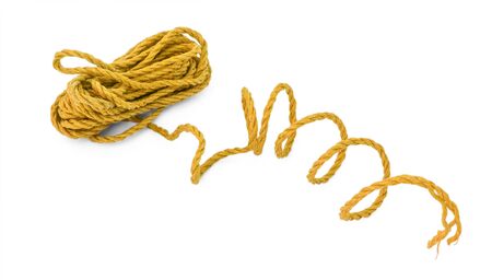 The orange brown yellow rope cord tie line in the coilの写真素材