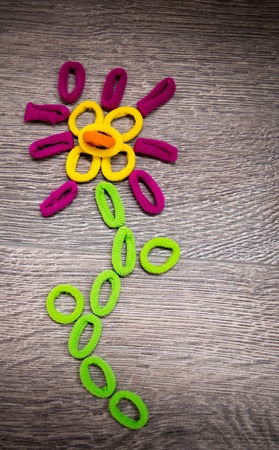 Set of colorful elastic hair bands -  shape of a flower, love you, natureの写真素材
