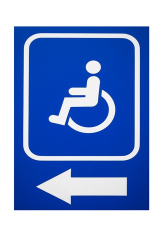 The sign Parking Space for Disabled People or Building entrance with ramp for disabled person on wheelchair and arrow left  isolated on whiteの写真素材