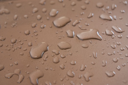 Drops of water on steel.の写真素材