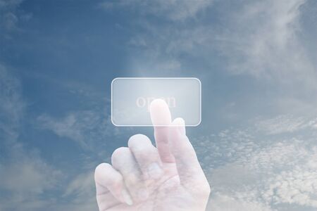 hand pushing a button