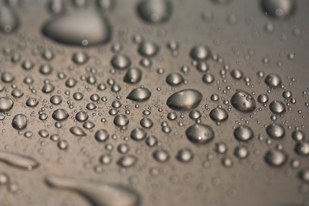 Water droplets on metal surfaces.