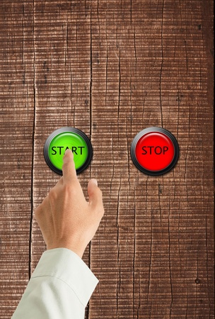 Hand pushing on a touch screen interface. 