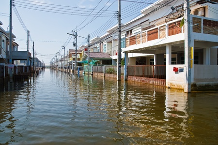 Bangkok, Thailand - November 16: The house that was flooded during the construction of 16 November 2011 at Pathum Thani. Bangkok, which is the worst flood in the history of Thailand.のeditorial素材