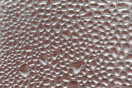 Water droplets on the glass surface.の写真素材