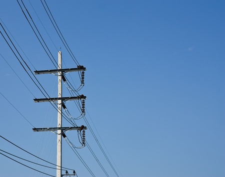 electricity post with blue sky の写真素材