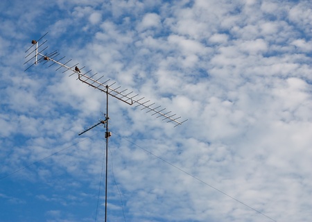 Satellite dish on the roof of buildingの写真素材