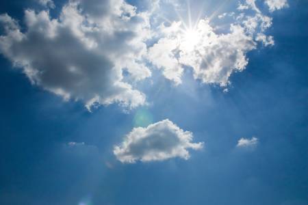 Blue sky and sun.の写真素材