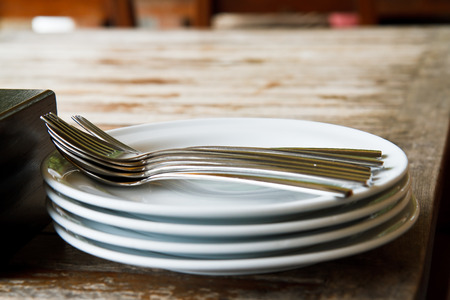 Empty plate with spoon