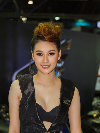 NONTHABURI, THAILAND - NOVEMBER 6  girl The 30th Thailand International Motor Expo on November 6, 2013 in Nonthaburi, Thailand のeditorial素材