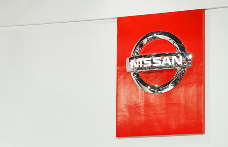 BANGKOK - DECEMBER 1  The emblem Nissan on White background, December 1, 2013 inBangkok  Nissan is a Japanese multinational automaker headquartered in Nishi-ku, Yokohama, Japan のeditorial素材
