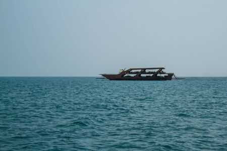 TRAT, THAILAND - DECEMBER 30  The Koh Chang ferry pier and ferry going to Koh Chang island on DECEMBER 5, 2013 in Trat, Thailand  The ferry transports thousands passengers dailyのeditorial素材