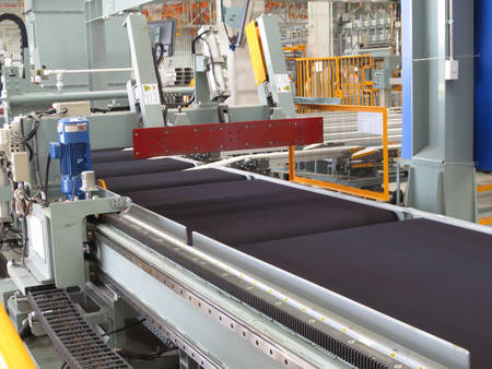 Cutting aluminum lines.