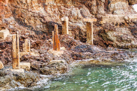 Waves hit the rocksの写真素材