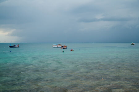 Ship with a backdrop of rain.の写真素材