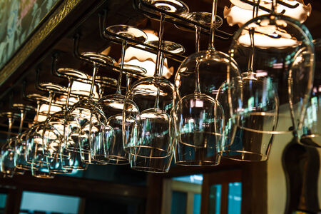 Wine glasses on the barの写真素材