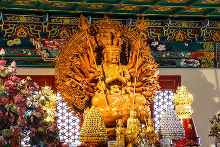 Wooden Guan Yin sculpture, holy chinese goddess in Chinese temple  Nonthaburi Province, Thailandのeditorial素材