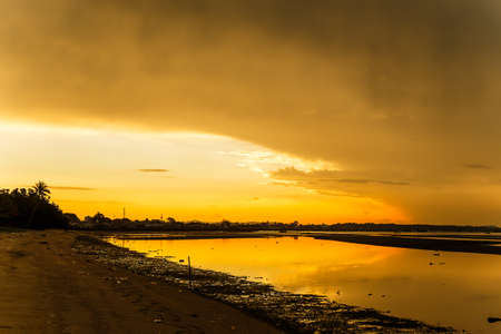 Atmosphere at sunrise on the beach