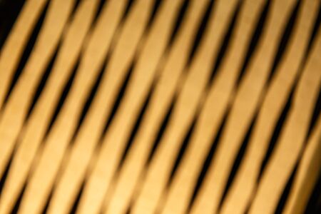 Yellow color with black cloth blur backgroundの写真素材