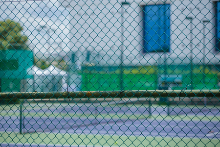 Steel mesh fence of the tennis courtsのeditorial素材