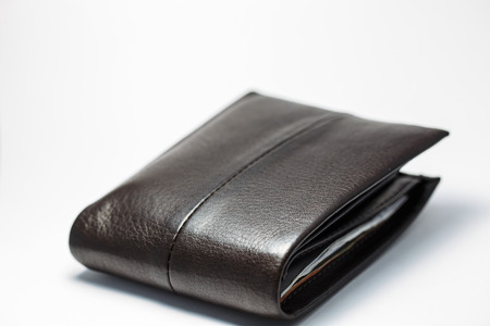 Brown purse on a white background.の写真素材
