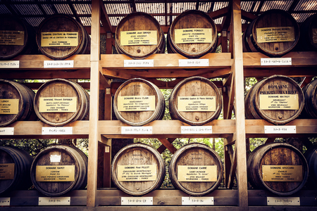 TOKYO,JAPAN-May 2, 2017: Traditional wine tanks on display inside the entrance to the shrine trust Meiji Jingu Harajuku to visitors.のeditorial素材