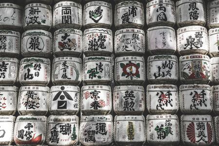 TOKYO,JAPAN-May 2, 2017: A traditional sake bucket used for wrapping with straw. Set up on the way to the Meiji Jingu Harajuku shrine for tourists to see.のeditorial素材