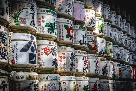 TOKYO,JAPAN-May 2, 2017: A traditional sake bucket used for wrapping with straw. Set up on the way to the Meiji Jingu Harajuku shrine for tourists to see.のeditorial素材