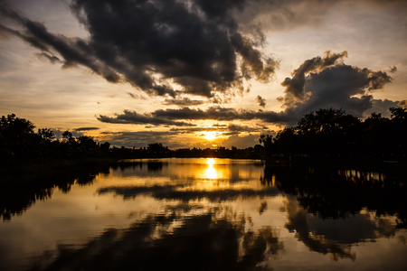 Landscape sunset  over lake in park.の写真素材
