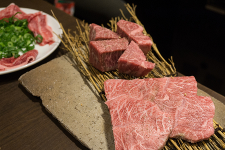 Korean food roasted meat, BBQ grill in korea style. Raw beef grill with charcoal.の写真素材