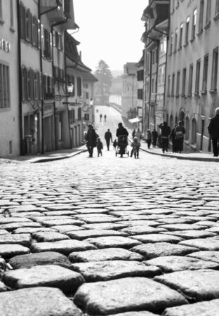 Cobblestone street in old city pf Solothurn by day, Switzerland
