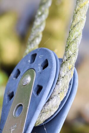 Pulley or cable, wire pull- The rigging element on the yacht or boat