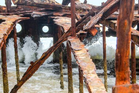 Inside the flooded Maheno Shipwreck on a stormy day on Fraser Islandの写真素材
