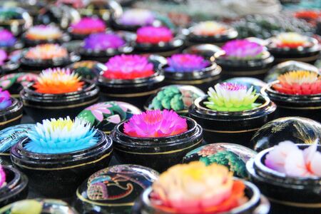 A soap and souvernier markt - night market - in Chang Mai Thailand. Colorful pots with flowers