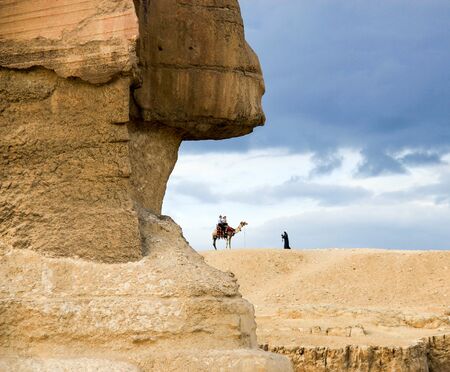 Symbol Egypt's - pyramid, Sphinx, camel and tourists in the back, Egypt