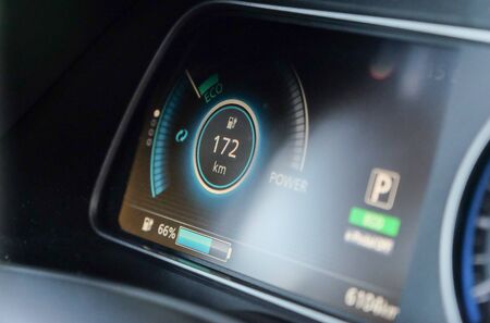 detail of dashboard and speedometer of electric car. You can see the remaining battery charge and autonomyの写真素材