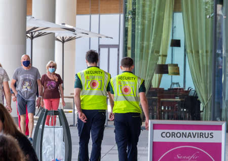 Italy, Milan, 05/31/2020, people walk wearing surgical mask due to the social distance for coronavirus covidのeditorial素材