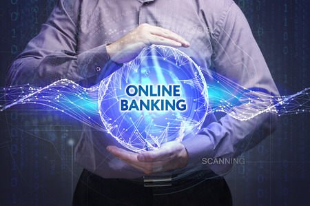 Business, Technology, Internet and network concept. Young businessman shows the word: Online bankingの写真素材
