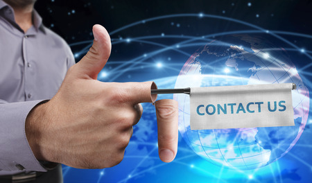 Business, Technology, Internet and network concept. Young entrepreneurs have a creative approach to the presentation: Contact usの写真素材