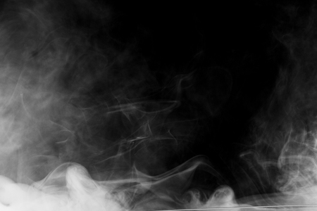 Movement of white smoke.black background. Smoke from cigarettes. Vapeの写真素材