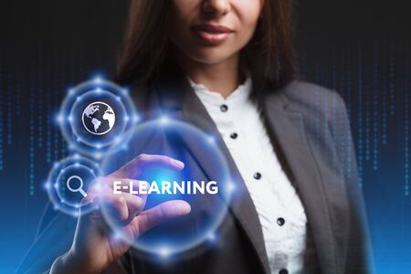 The concept of business, technology, the Internet and the network. A young entrepreneur working on a virtual screen of the future and sees the inscription: E-learningの写真素材