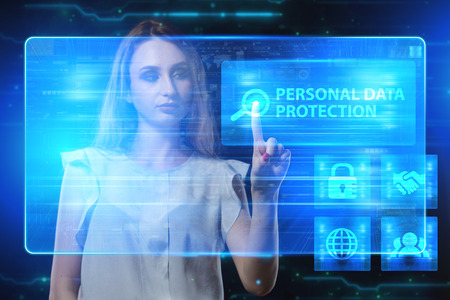 The concept of business, technology, the Internet and the network. A young entrepreneur working on a virtual screen of the future and sees the inscription: Personal data protectionの写真素材