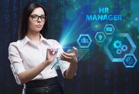 The concept of business, technology, the Internet and the network. A young entrepreneur working on a virtual screen of the future and sees the inscription: HR managerの写真素材